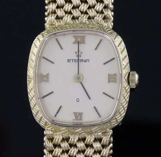 A ladys 9ct gold Eterna quartz wristwatch, on a 9ct woven link Eterna bracelet,